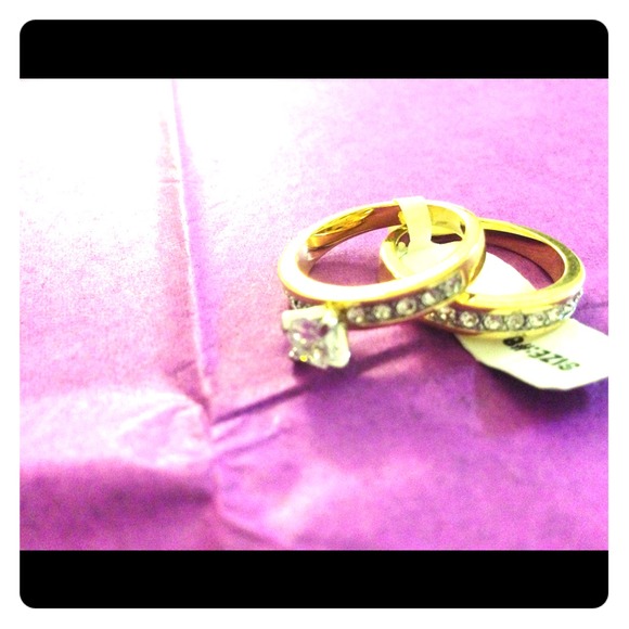 Size 8 gold plated cubic zirconium ring.