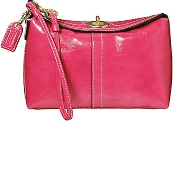 Coach pink patent capacity wristlet