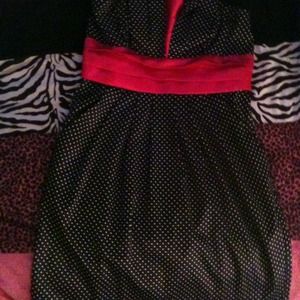 Black and pink polka dot strapless dress.