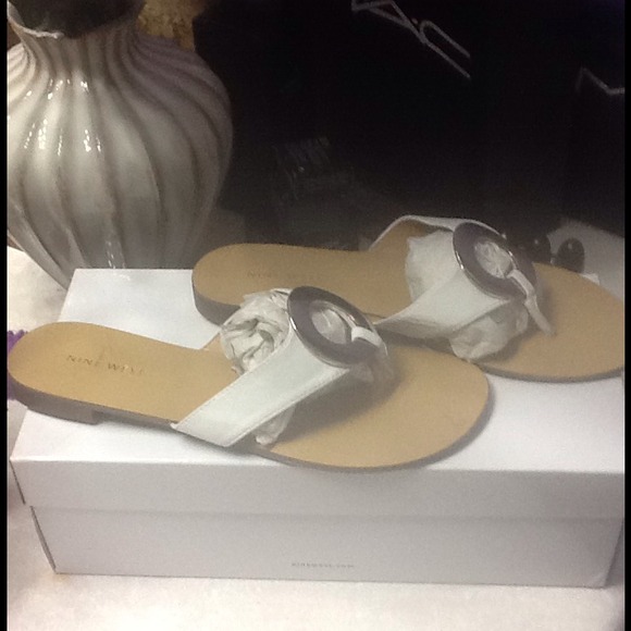 Nine West white sandal with silver buckle