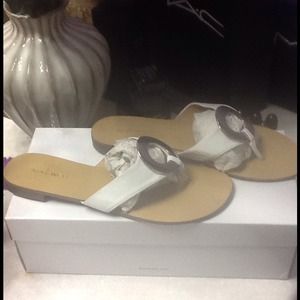 Nine West white sandal with silver buckle