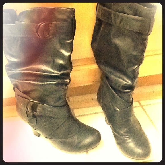 Black leather buckle boots