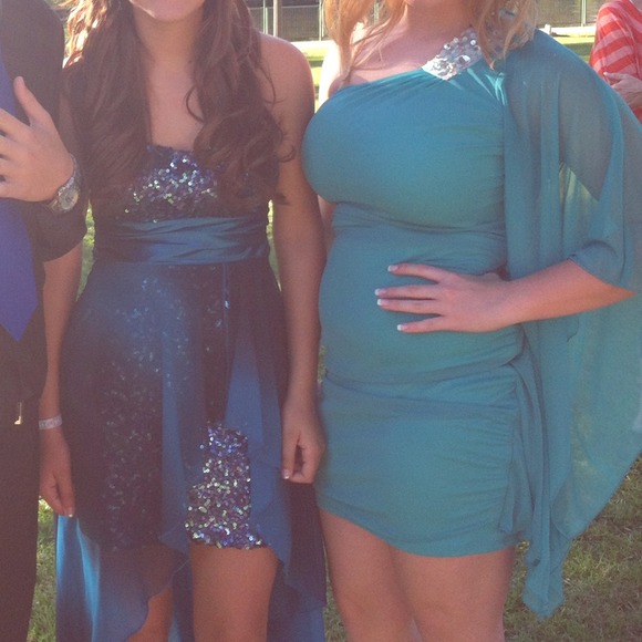 teal one sleeved dress!