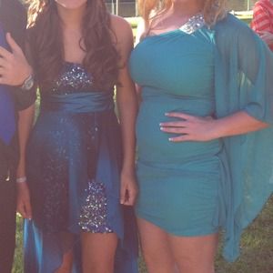 teal one sleeved dress!