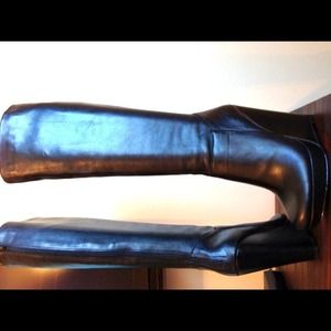 Black Trouvé Assumption wedge heel boots.