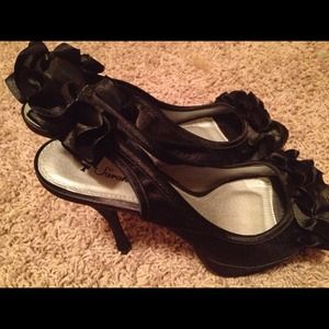 Black ruffle heels