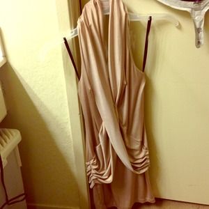 Bebe size small. Shimmery tan color.