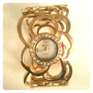 New (never been worn) Gold Cuff Watch