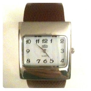 Safari leather cuff with large metal frame