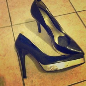 BabyPhat black sparkly heels with silver lined.