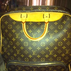 LV Evasion. Excellent cond $ 700.   727-623-8847