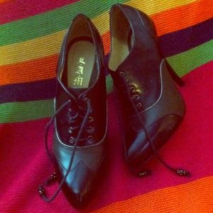 wing tip platform & stiletto heel loafer style