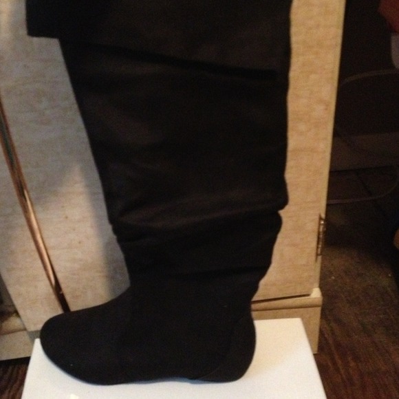 Black suede knee high boots!