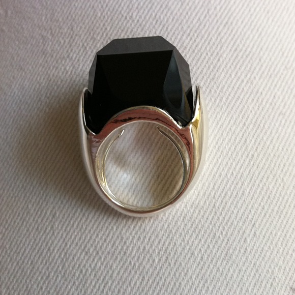 Chunky black faceted ring.