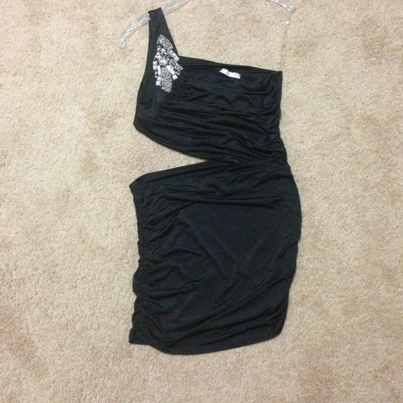 SOLD Black cut-out dress with sequined detail.