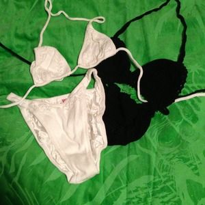Identical black and white crochet bikinis