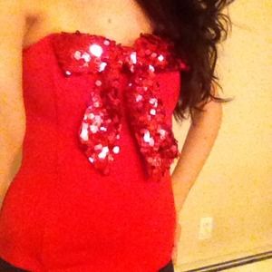 Strapless Corset. Red, with red sequin bow.