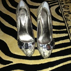 Never before worn Pelle Moda snake skin/jewl heels