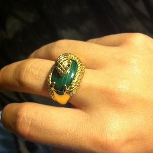 Gold snake ring with green stone