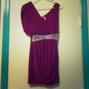 Form fitting dress greek inspired design.