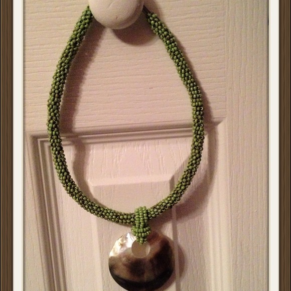 Sold Green bead and shell necklace