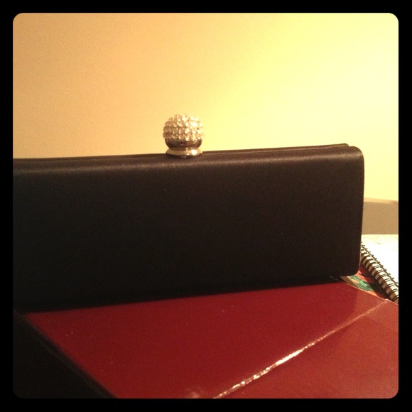 Carols Fellini clutch