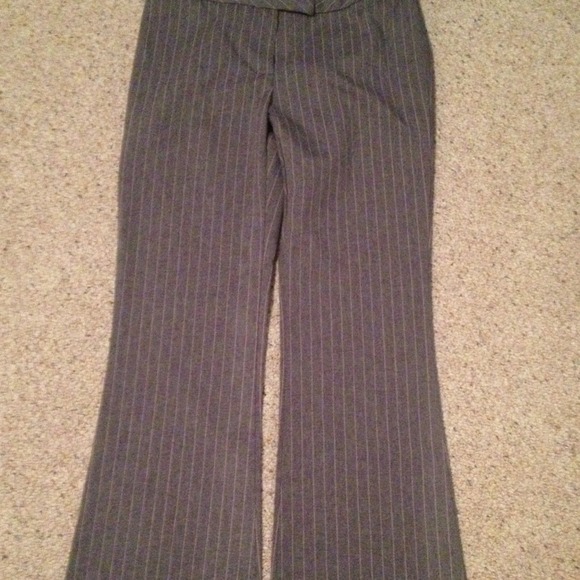 Grey slacks with pink pinstripes.