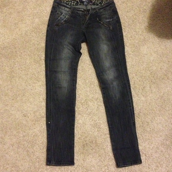Size 7 skinny jeans with funky zippers!