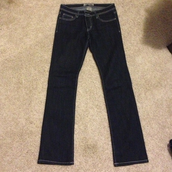 Long and dark size 7 jeans. Pretty pocket detail!