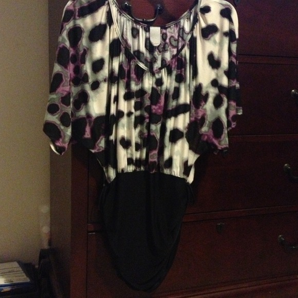 Small mini dress with purple and black spotted top
