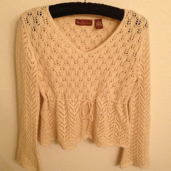 Not for sale. Very pretty cream sweater