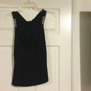 Black Cache Top with chains on the shoulders.