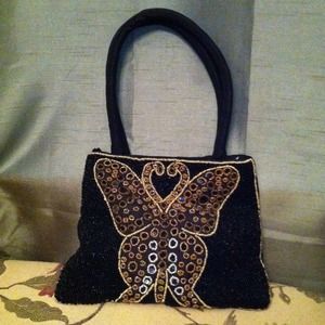 Black beaded evening bag with gold butterfly
