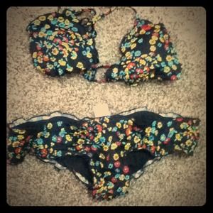 Cute swimsuit size small but fits extra small also