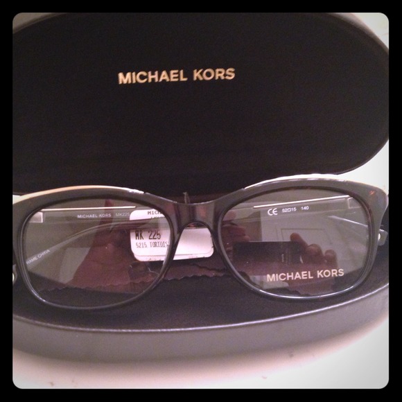 Michael Kors. Tortoise trimmed in gold