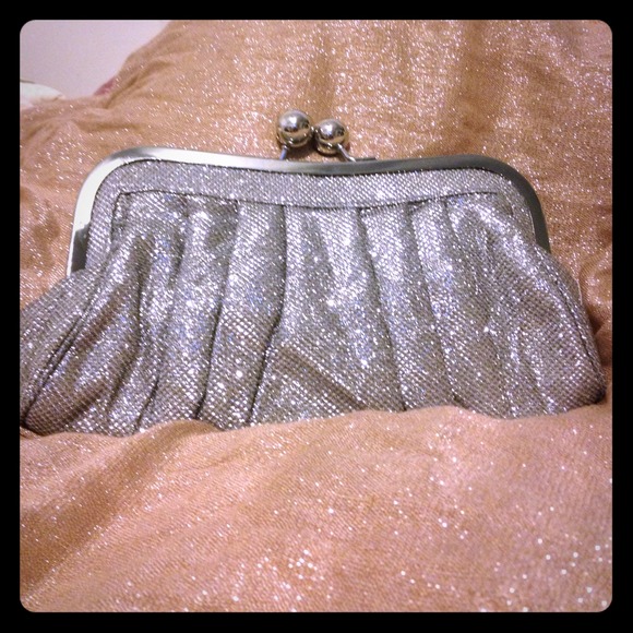 Cute silver clutch !