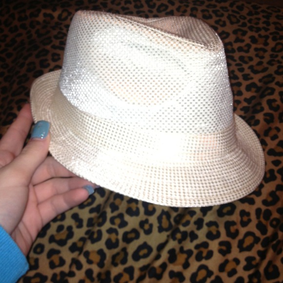 a cute little tanish white hat