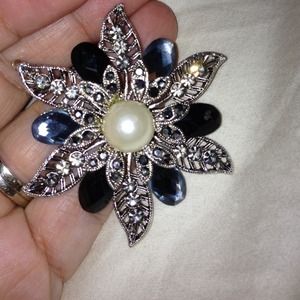 Black, silver and a pearl flower