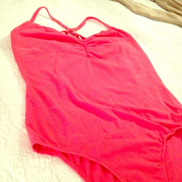 Coral bodysuit. Size M but fits like S on top.
