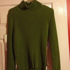 Green turtleneck sweater.