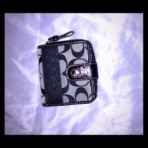 Signature coach wallet