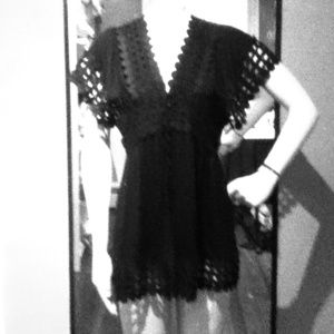 Not sure if its a shirt or cover up, had 2have it.