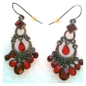 Earrings with red jeweled accents