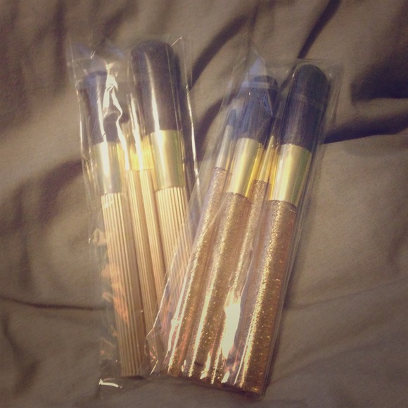 Estée Lauder brush sets (2) and 2 brush sets