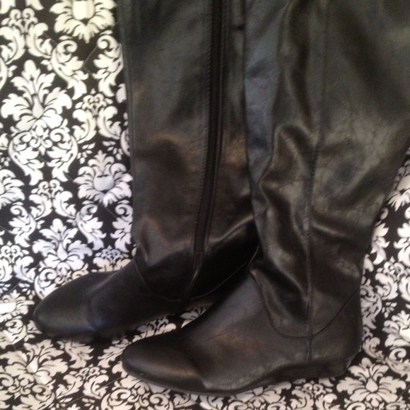 Knee high black boots