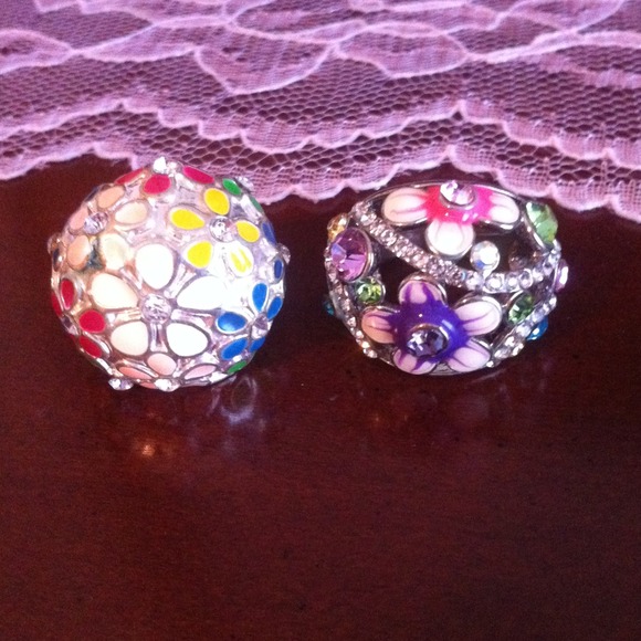 2 silver multi colored rings! Close to size 7