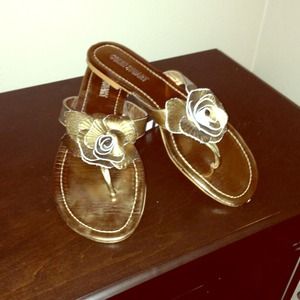 Bronze flip flop sandals