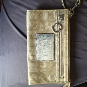 Coach gold wristlet