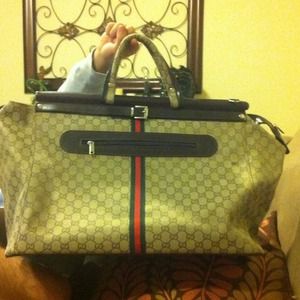 Gucci duffle bag (RESERVED until Saturday)