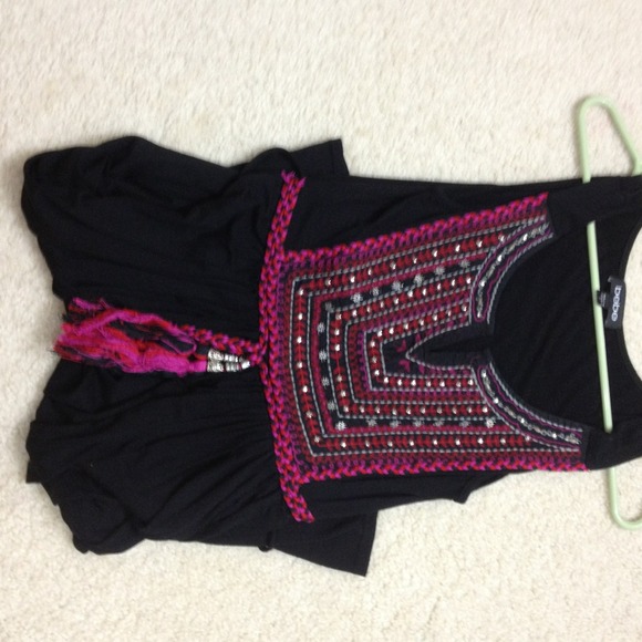 Black dress, with a very nice detail on front